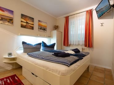 Das Schlafzimmer mit Doppelbett