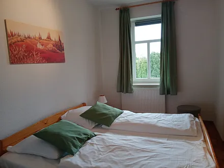 Schlafzimmer mit Doppelbett