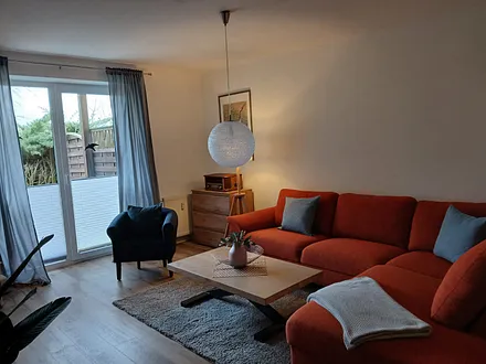 Couchecke und Durchgang zur Terrasse