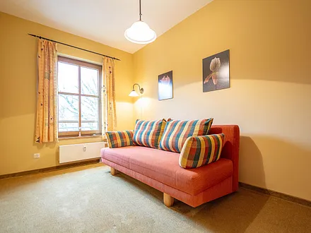 Das zweite Schlafzimmer mit ausziehbarer Schlafcouch