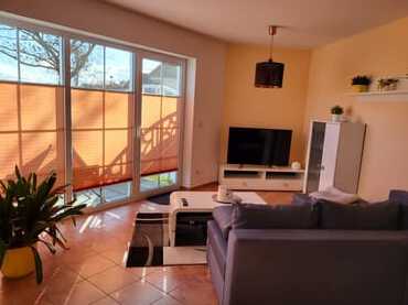 Wohnzimmer mit angrenzender Terrasse
