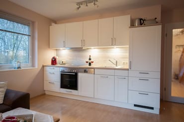 Küche im Wohnzimmer integriert