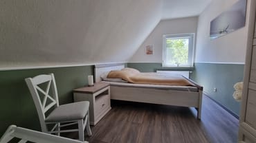 Schlafzimmer 1 mit Doppelbett
