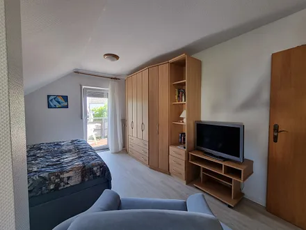 kombiniertes Wohn-Schlafzimmer