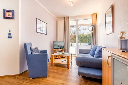 Der Balkon ist vom Wohnzimmer aus begehbar.