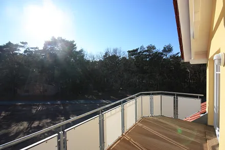 Bfantastischer, unverbauter Ausblick vom südwest Balkon auf den Küstenwald und den Sonnenuntergang