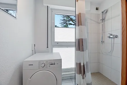 Dusche und Wäschetrockner