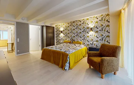 1. Schlafzimmer mit Bad en Suite