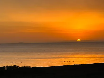 Sonnenaufgang vom Balkon aus