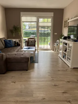 Wohnzimmer mit Doppelbettcouch