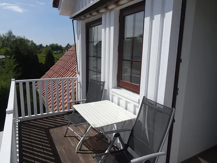 Balkon mit Sonnenmarkise