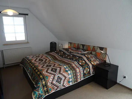 Schlafzimmer 1 mit Doppelbett
