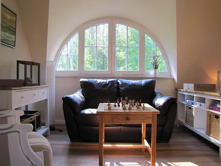 Schlafzimmer mit Relaxbereich