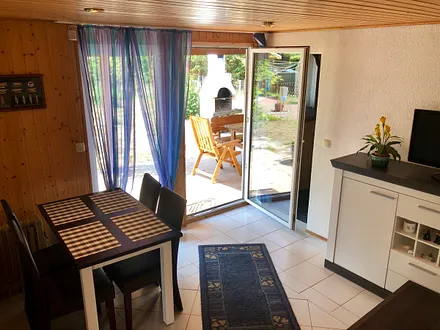 Wohnzimmer mit Essecke 