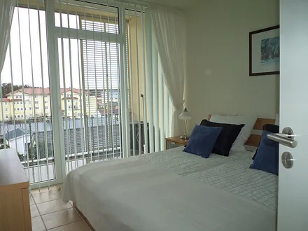 Schlafzimmer mit Balkon