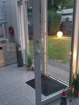 Terasse/ Wintergarten mit Kamin