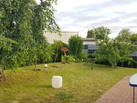 Liebevoll angelegter Garten mit schönen Details