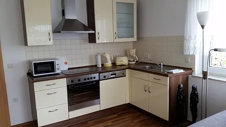 Wohnzimmer + offene Küche