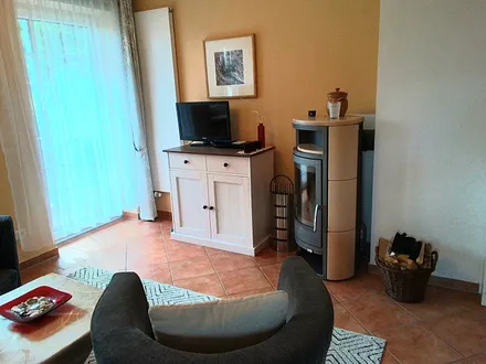 Balkontür und Kamin