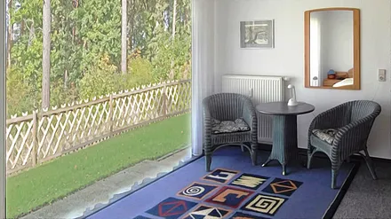 Kleine Sitzgruppe im Schlafzimmer