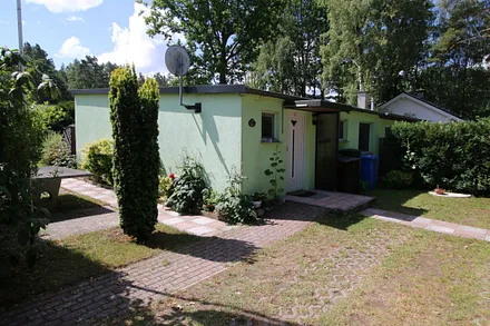 Ferienhaus Rückseite mit Eingang