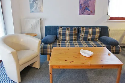 Sitzecke mit ausziehbarer Sitzcouch