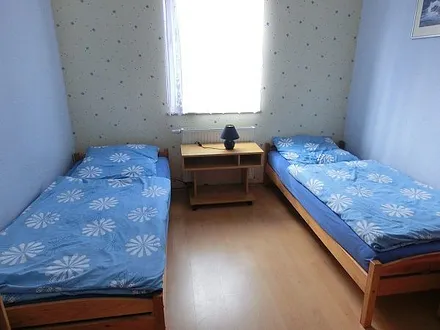 Schlafzimmer mit 2 Einzelbetten