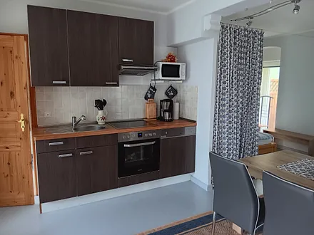 Küche mit angrenzendem Schlafbereich