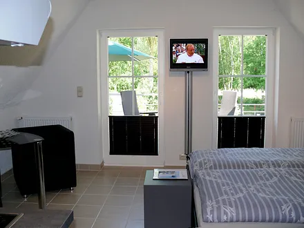 Blick vom Zimmer auf die Dachterrasse 