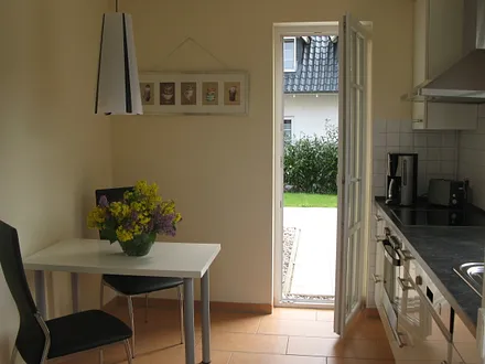 Küche mit Ausgang zur Terrasse