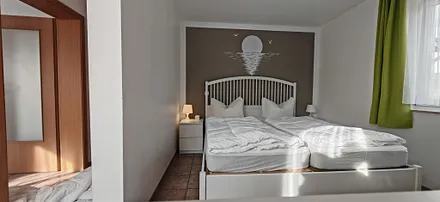 gemütliches Schlafzimmer mit Kingsizebett 180x200 cm