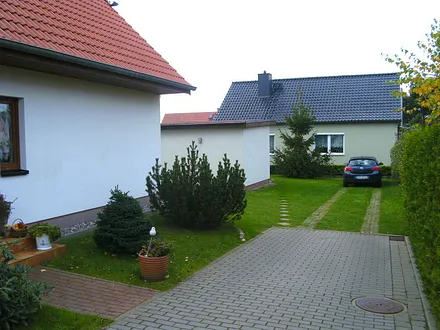 Sie sehen unser Haus, Ihr Ferienhaus mit dem Parkplatz