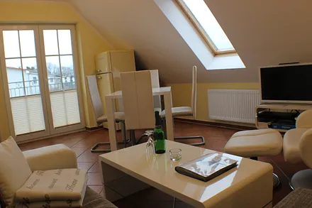 Wohnzimmer mit Küche