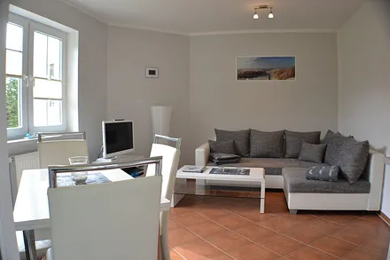 Wohnzimmer mit Küche