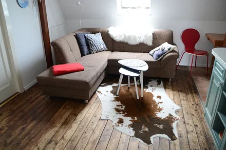 Wohnzimmer mit Küche