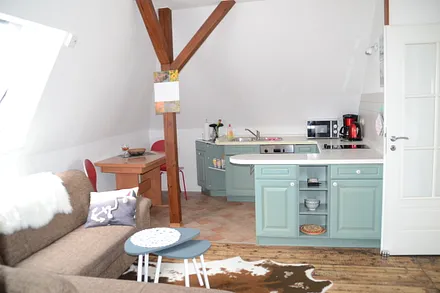 Wohnzimmer mit Küche