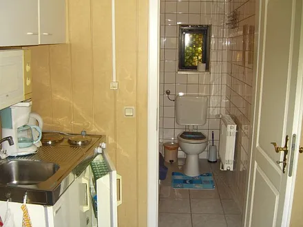 Küche und Zugang zum WC