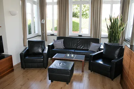 Wohnzimmer mit Ledermöbeln