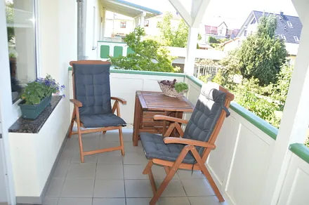 Sitzecke auf der überdachten Terasse