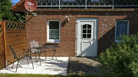 Ansicht der Wohnung vom Garten aus,(jetzt ohne Balkon,aber erweitertem Schl.raum)