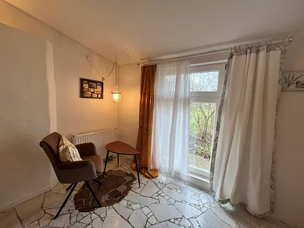 Schlafzimmer - Sitzecke mit Blick in den Garten