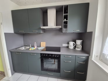 Küche (u.a. mit Geschirrspüler und Backofen)