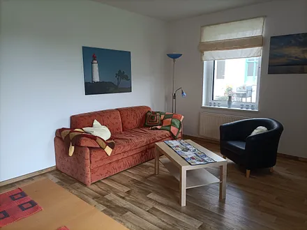 Wohnzimmer mit Ausziehcouch