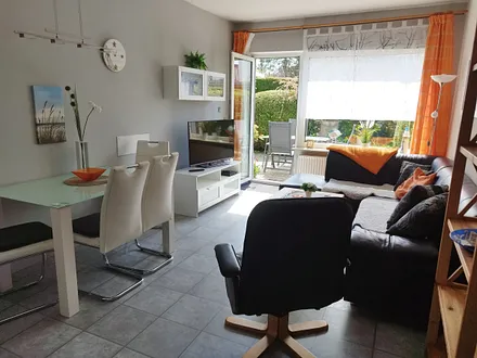 Wohnzimmer mit integrierter Küche, Süd- Terrasse