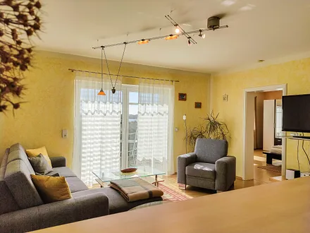 Wohnbereich mit Balkon und Blick über Sellin/ Selliner See