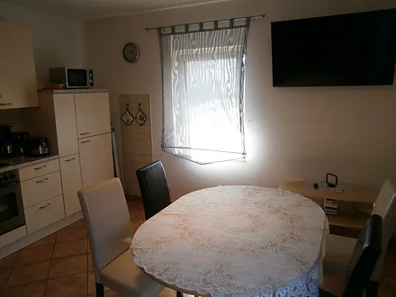 Küche/ Essbereich/ TV