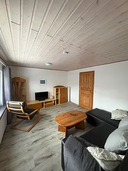 Das Wohnzimmer der Wohnung 1 