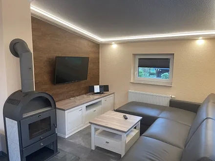 Wohnzimmer mit Kamin