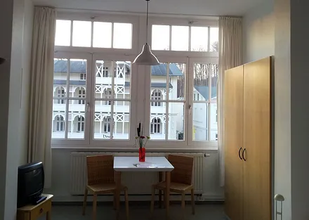 Unser kleinstes Appartement D305 Typ D305  verfügt über die Fensterfront des ehemaligen Wintergartens.