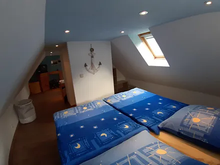 Schlafbereich mit Doppelbett